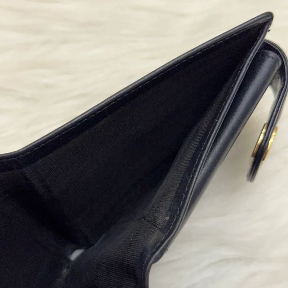 SALVATORE FERRAGAMO - BLACK LEATHER GOLD PLATED SECURE CLOSURE BIFOLD WALLET